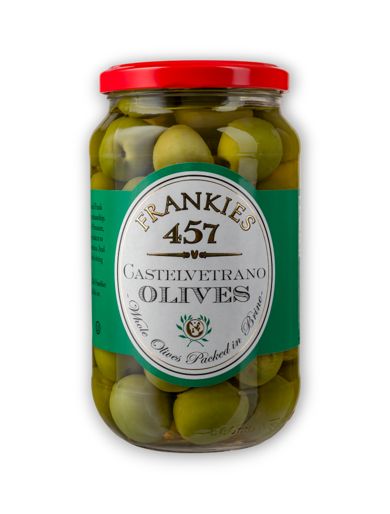A jar of whole Castelvetrano olives with a red lid, labeled 'Frankies 457'