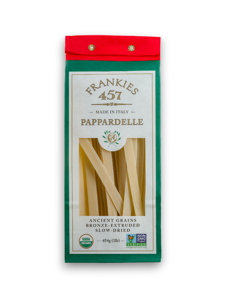 Packaging of Frankies 457 Pappardelle pasta, featuring a clear window showing wide, flat noodles. Green and red colors with Italian branding accents.