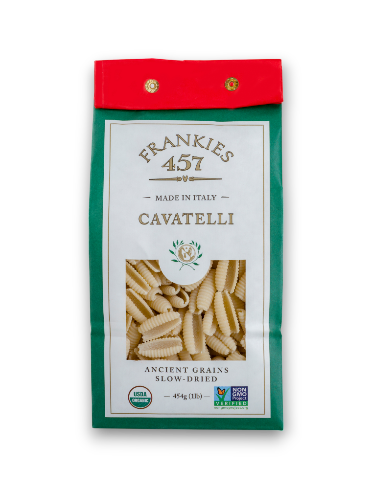 A package of Frankies 457 Cavatelli pasta with a clear window showing the dried pasta inside. The label indicates that the pasta is made in Italy and is organic.